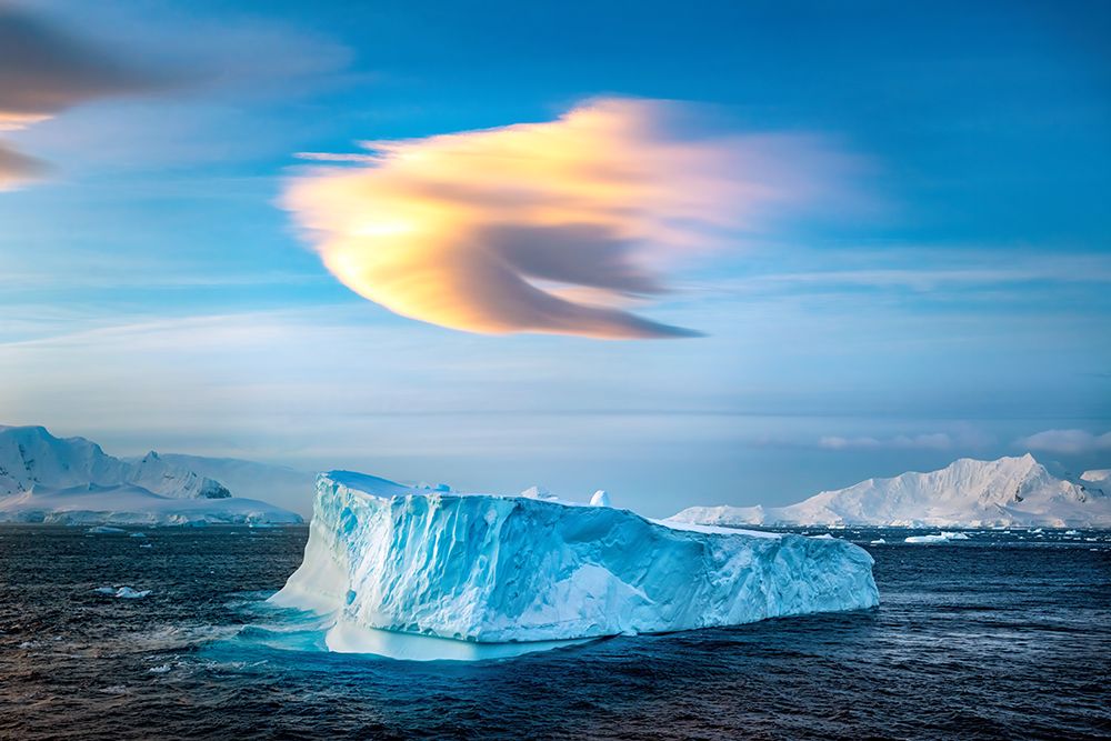 Breathtaking Antarctic Iceberg Under Dramatic Sky: Discover The Majestic Beauty Of Polar Landscapes art print by Max Seigal for $57.95 CAD