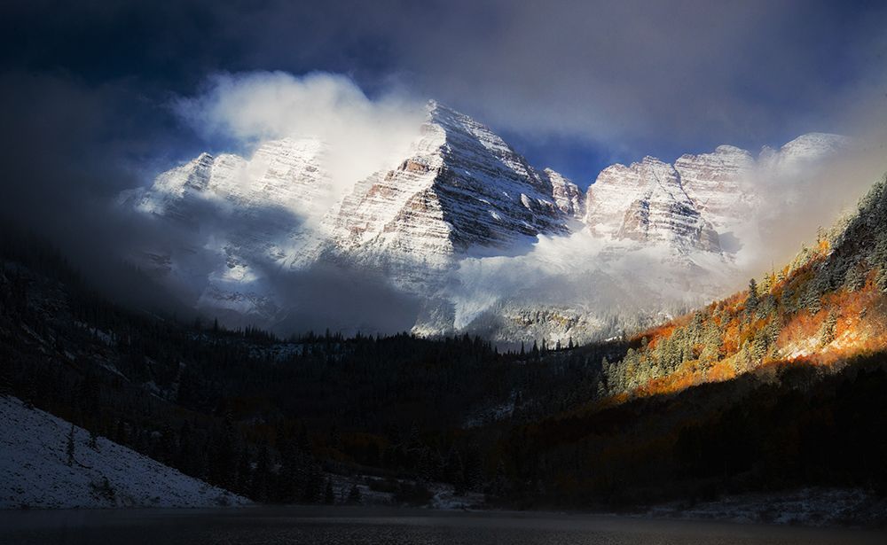 Breathtaking View Of Snow-Covered Mountain Peaks Surrounded By Mist In Autumn Forest Landscape art print by Max Seigal for $57.95 CAD