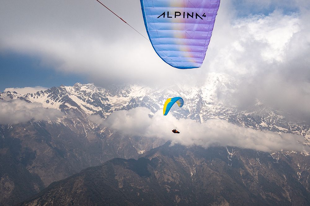 Paragliding In The Majestic Himalayan Mountains art print by Max Seigal for $57.95 CAD