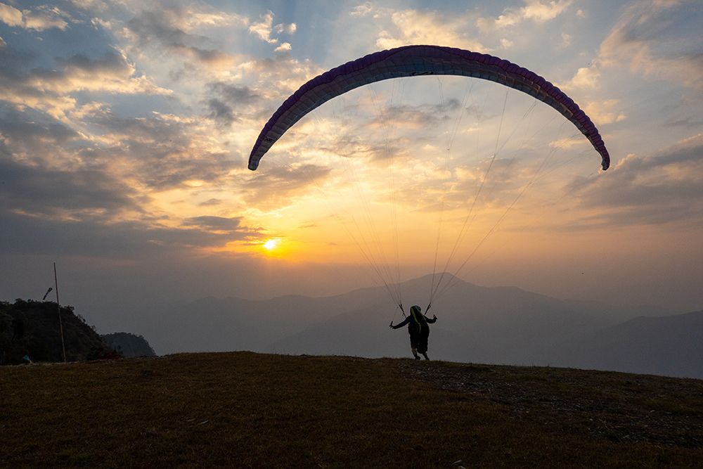 Experience Thrill Of Paragliding Amidst Breathtaking Sunsets And Mountain Views - Enthusiasts! art print by Max Seigal for $57.95 CAD