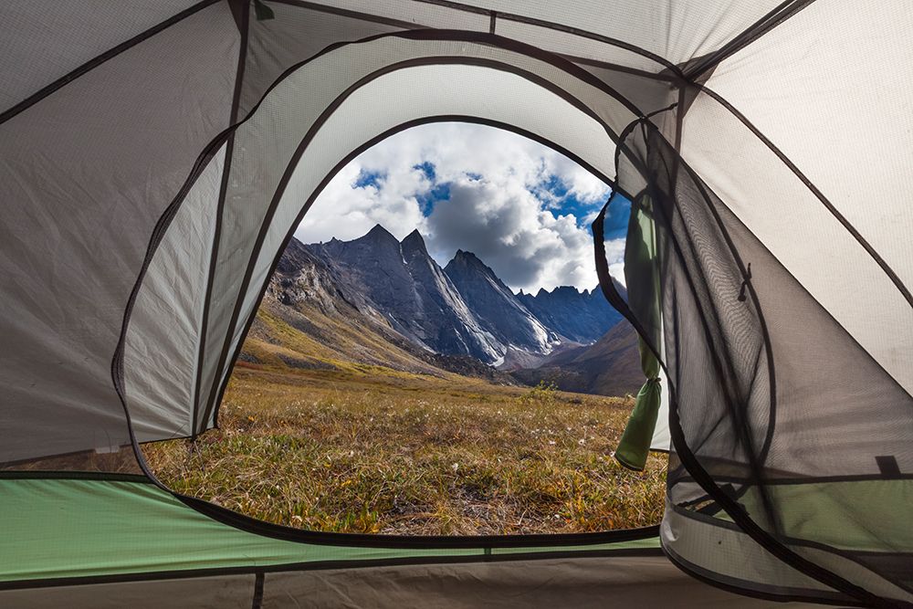 East And West Maiden And Camel Peaks In Distance, Viewed From Inside Tent, Arrigetch Peaks, Alaska. art print by Patrick J Endres for $57.95 CAD