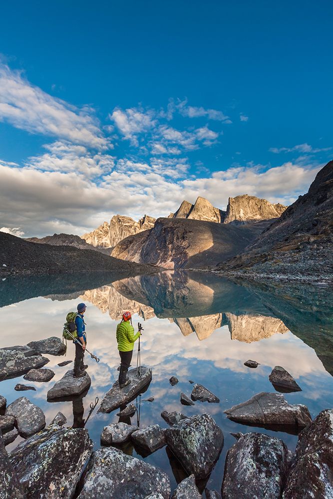 Hikers View East And West Maiden And Camel Peaks As They Reflect In Mountain Lake In Alaska. art print by Patrick J Endres for $57.95 CAD