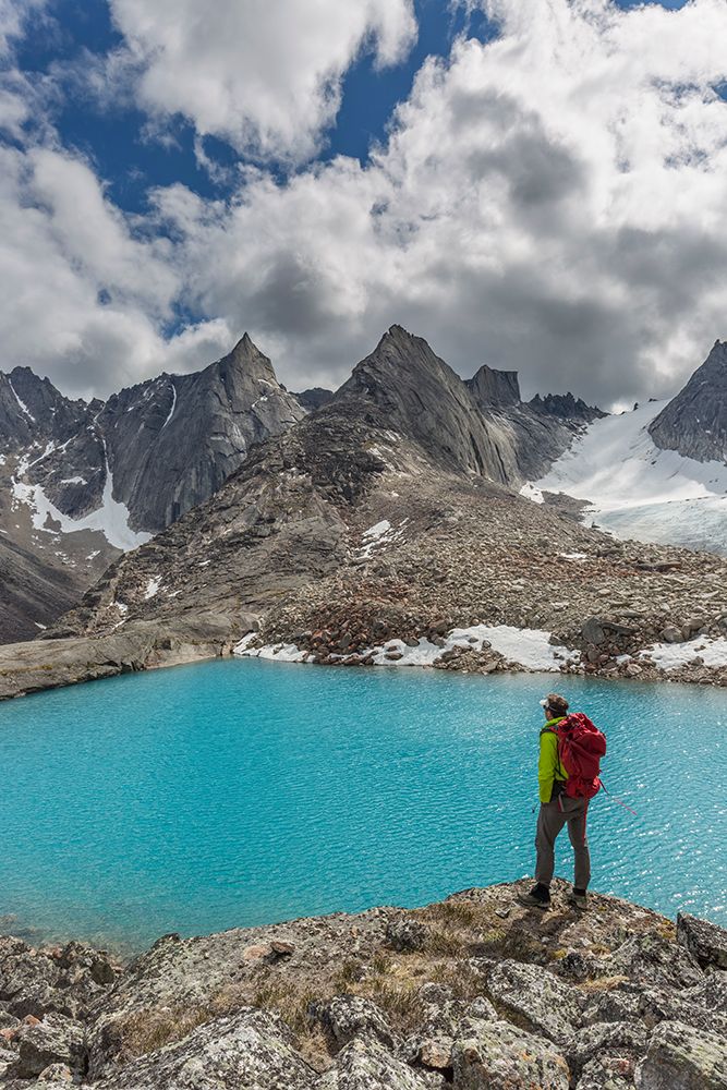 Hiker Views Blue, Glacier Lake High In Aquarius Valley Of Arrigetch Peaks, Gates Of Arctic Alaska art print by Patrick J Endres for $57.95 CAD