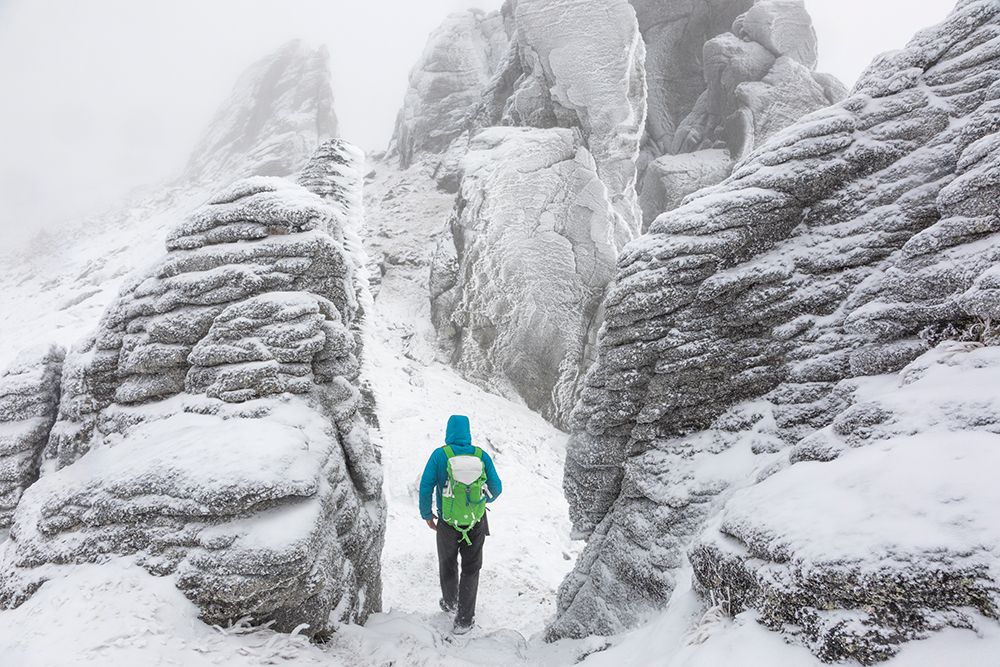 Hiker Traverses Hoarfrost Covered Granite Tors On Ridge To Mt. Prindle, Steese Nca, Interior Alaska art print by Patrick J Endres for $57.95 CAD