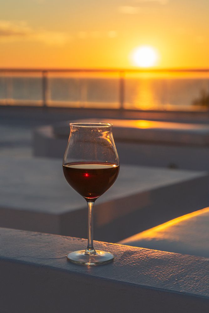North America, Mexico, Nayarit, Bahia De Banderas, Nuevo Vallarta. Glass Of Wine At Sunset. art print by Emily M Wilson for $57.95 CAD