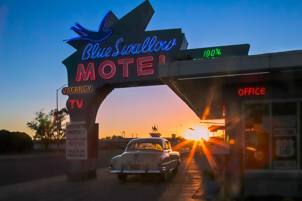 Tucumcari,New Mexico. Famous Blue Swallow Motel On Route 66, 1950S Car Parked In Front Of Lobby. art print by Julien McRoberts for $57.95 CAD