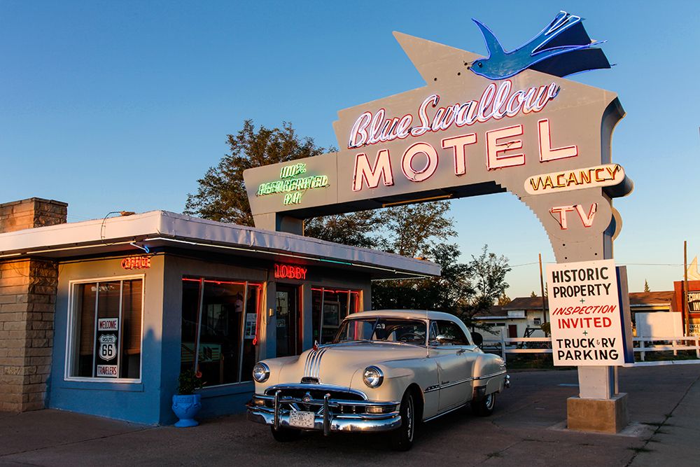 Tucumcari,New Mexico. Famous Blue Swallow Motel On Route 66, 1950S Car Parked In Front Of Lobby. art print by Julien McRoberts for $57.95 CAD