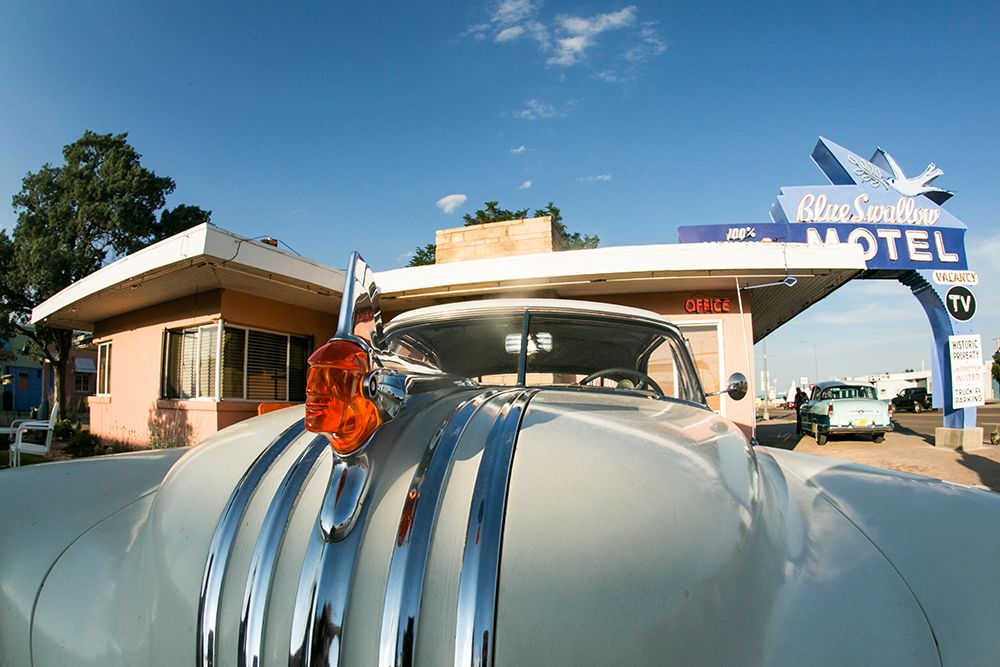Tucumcari,New Mexico. Famous Blue Swallow Motel On Route 66 With Old Car Parked In Front. art print by Julien McRoberts for $57.95 CAD