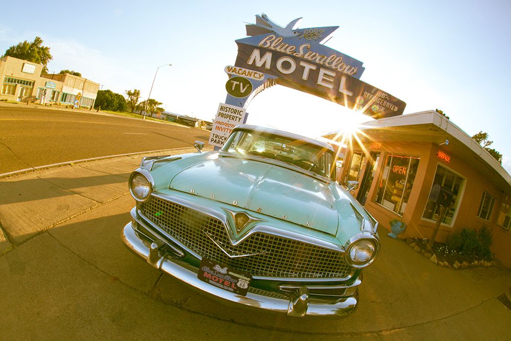Tucumcari,New Mexico. Famous Blue Swallow Motel On Route 66 With Old Car Parked In Front. art print by Julien McRoberts for $57.95 CAD
