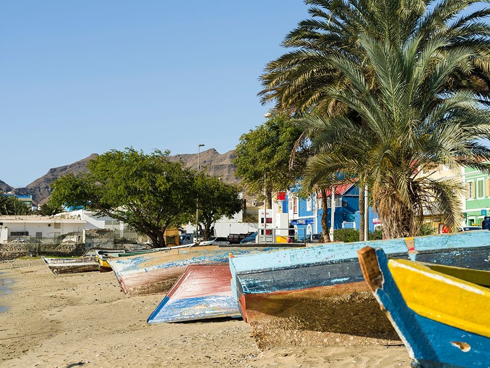 Traditional fishing boats on the beach of the harbor City Mindelo-a seaport Africa art print by Martin Zwick for $57.95 CAD