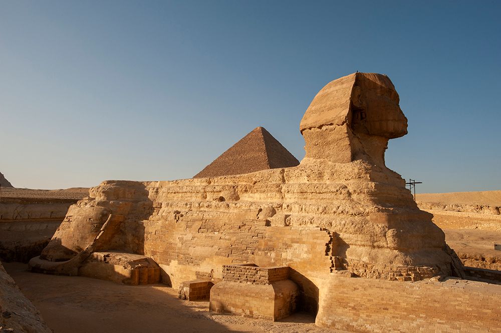 Africa, Egypt, Giza. Side view of the famous sphinx statue in Giza. art print by Alison Wright for $57.95 CAD