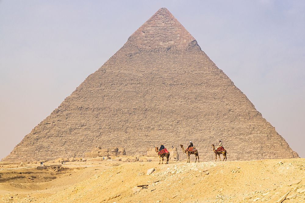 Giza-Cairo-Egypt Men on camels at the Great Pyramid complex art print by Emily M. Wilson for $57.95 CAD