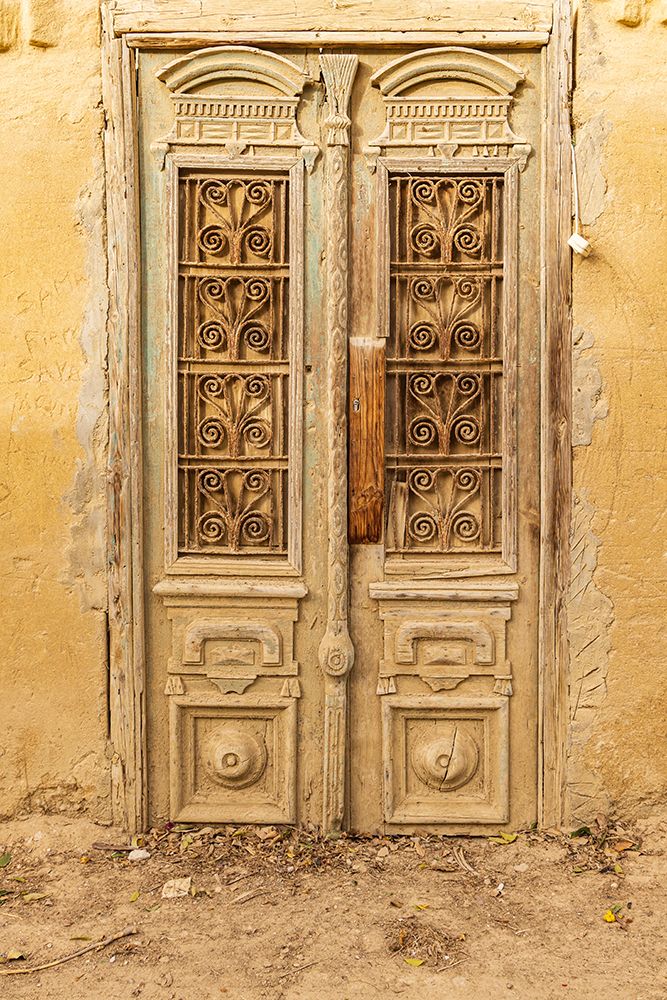 Faiyum-Egypt Wooden door on a building art print by Emily M. Wilson for $57.95 CAD