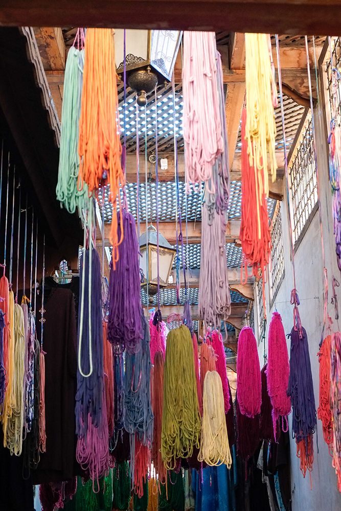 Fes-Morocco Skeins of yarn hang to dry after being hand dyed art print by Julien McRoberts for $57.95 CAD