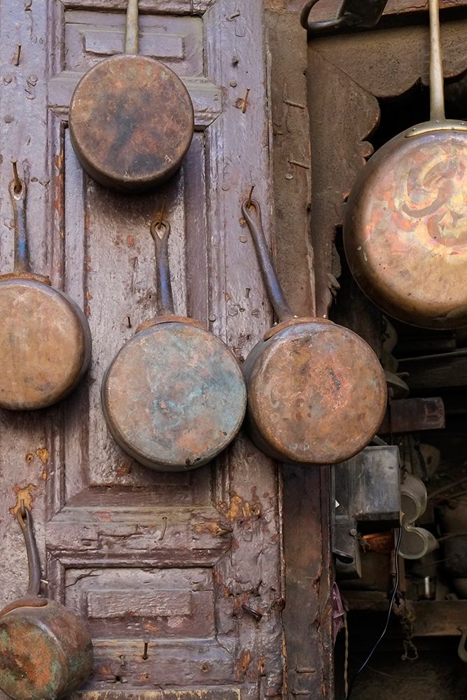 Fes-Morocco Antique copper pans for sale in the medina art print by Julien McRoberts for $57.95 CAD