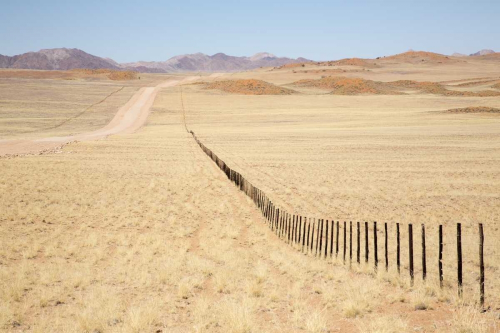 Namibia, Namib Desert Road and fence in desert art print by Wendy Kaveney for $57.95 CAD