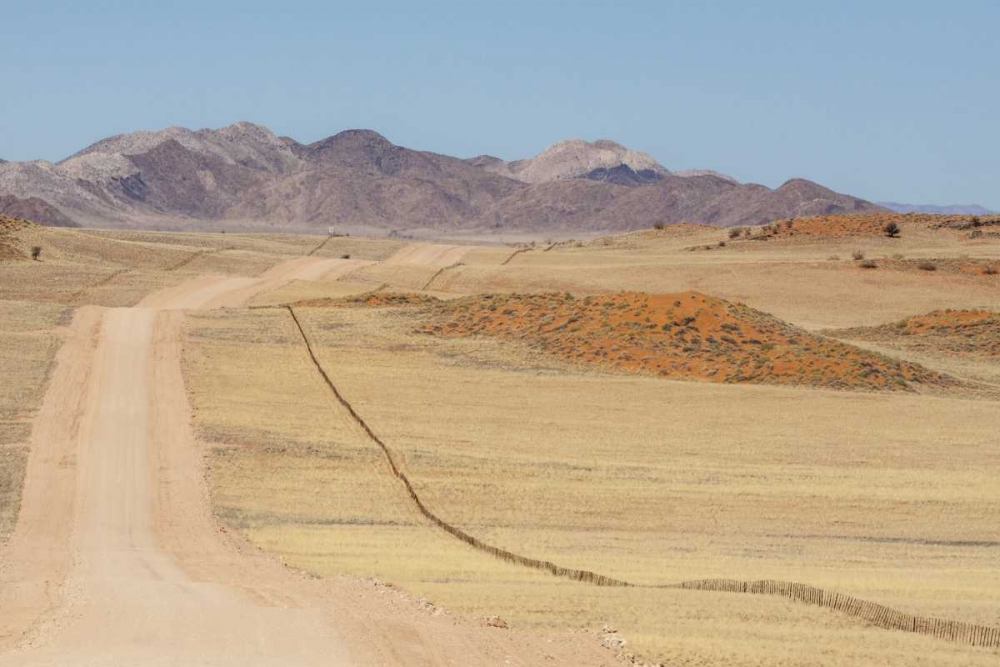 Namibia, Namib Desert Road and fence in desert art print by Wendy Kaveney for $57.95 CAD