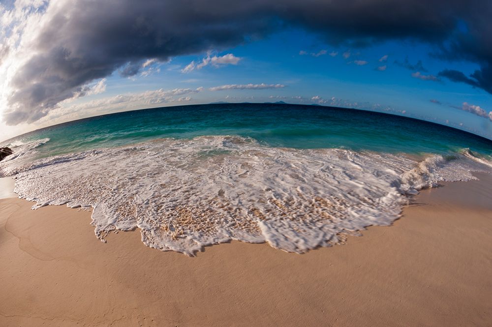 Fisheye view of Indian Ocean surf surging onto a sandy beach Anse Macquereau Beach-Seychelles art print by Sergio Pitamitz for $57.95 CAD