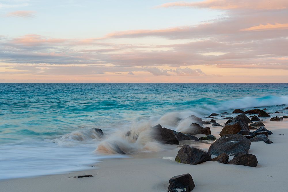 Indian Ocean surf crashing onto rocks on tropical beach at sunset Anse Bambous Beach-Seychelles art print by Sergio Pitamitz for $57.95 CAD