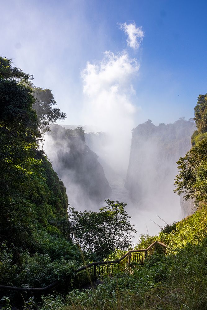 Victoria Falls water and drops in the air. Zambezi National Park. Zimbabwe. art print by Tom Norring for $57.95 CAD