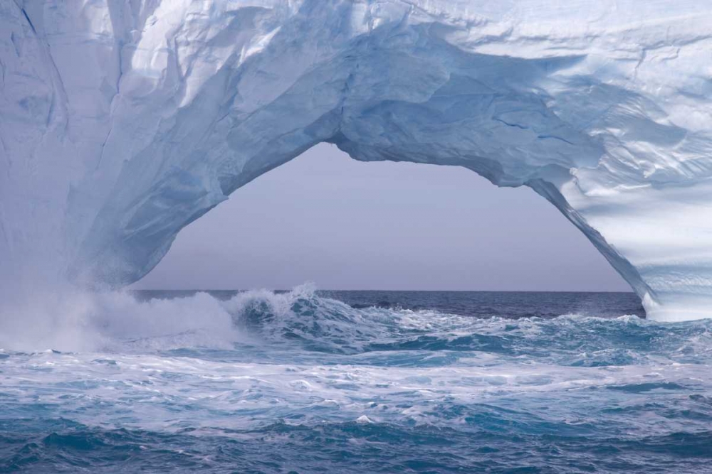 South Georgia Island Waves splash under iceberg art print by Don Paulson for $57.95 CAD