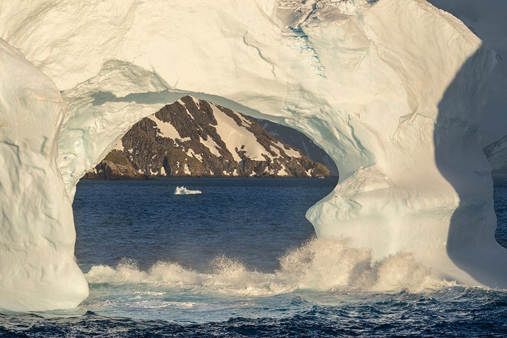 Antarctica-South Georgia Island-Coopers Bay Iceberg arch and mountains at sunrise art print by Jaynes Gallery for $57.95 CAD