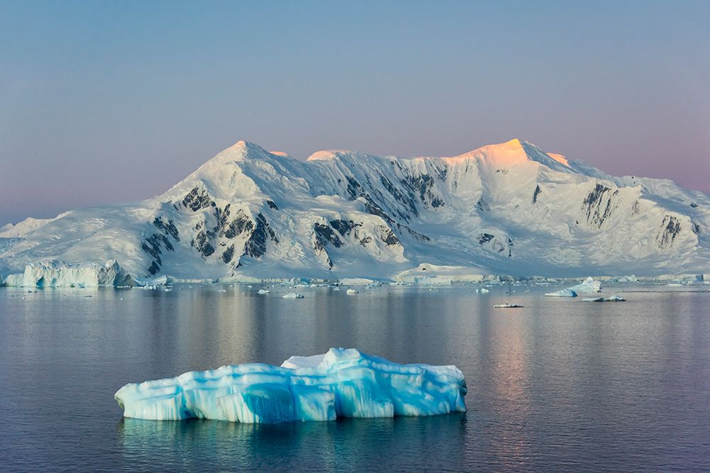 Snow covered island and floating ice in South Atlantic Ocean-Antarctica art print by Keren Su for $57.95 CAD