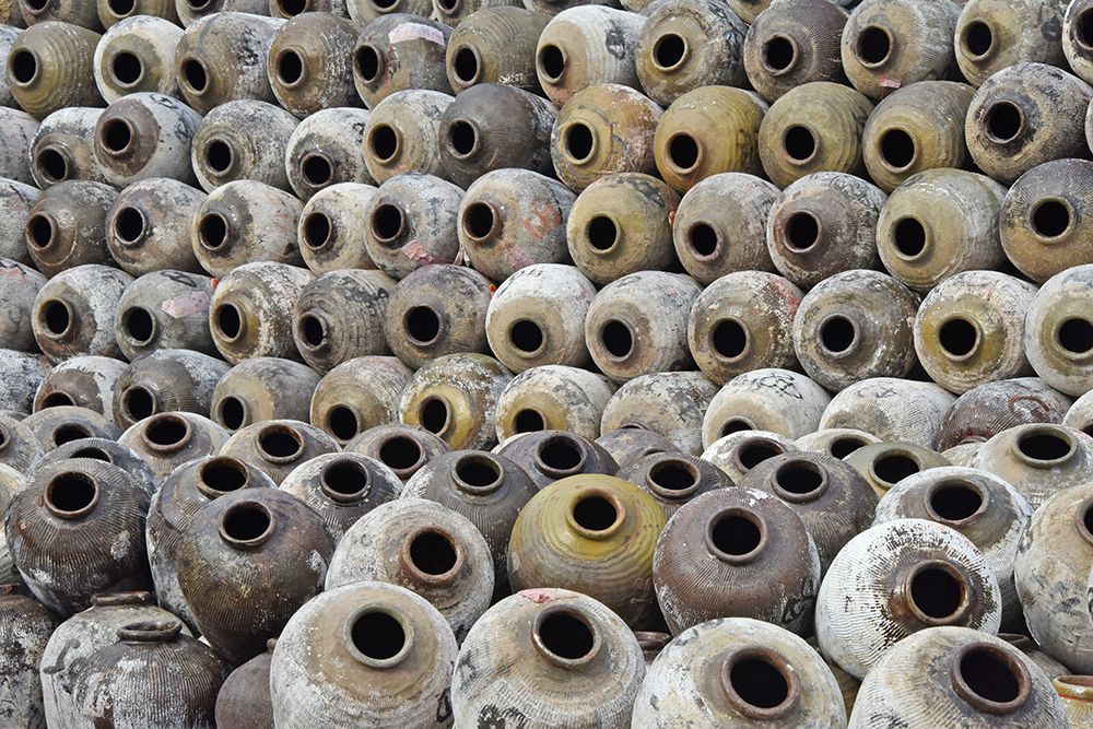 Big pile of wine jars in a winery-Zhejiang Province-China art print by Keren Su for $57.95 CAD