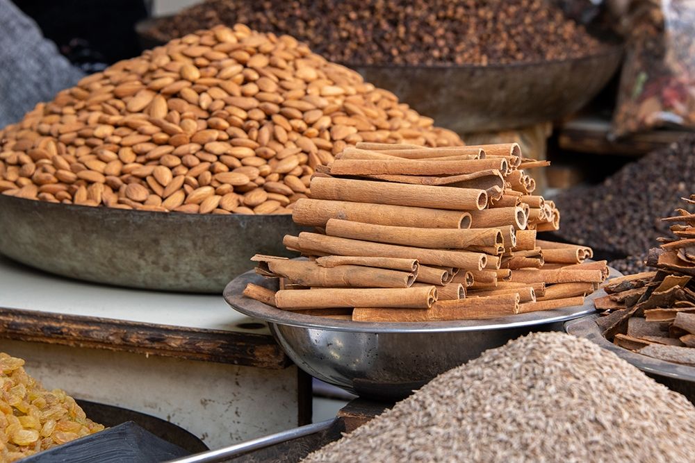 India-Delhi-Old Delhi Old Delhi street market Mixed nuts-spices and cinnamon sticks art print by Cindy Miller Hopkins for $57.95 CAD
