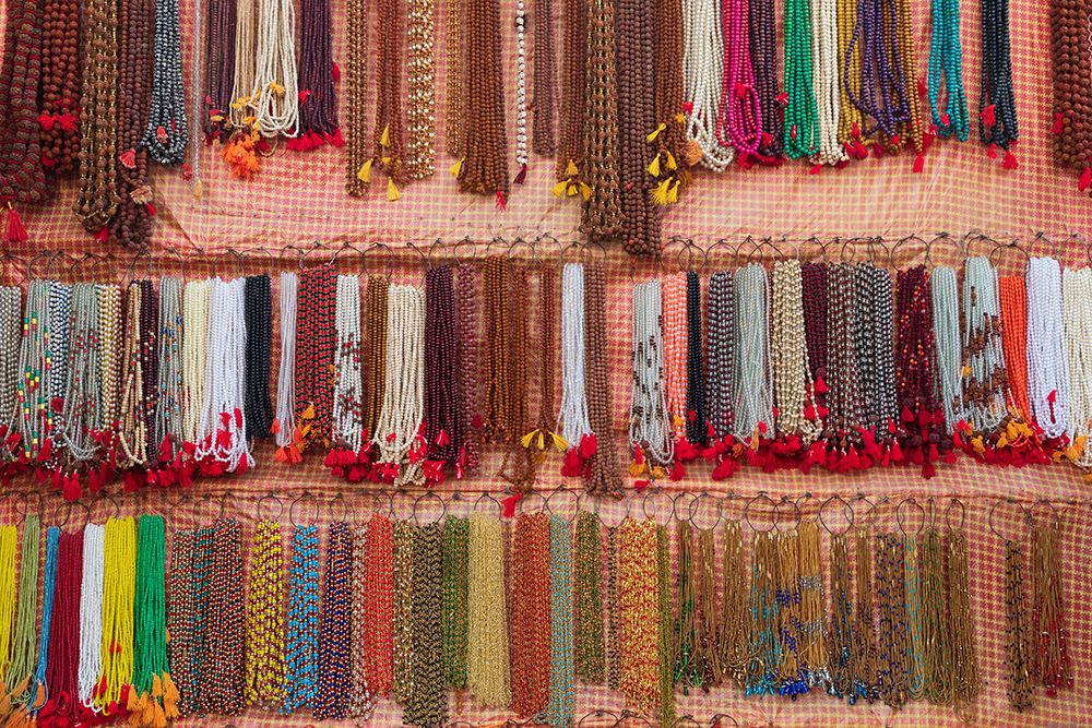 India, Uttar Pradesh, Varanasi, Bangali Tola. Beaded necklaces for sale. art print by Emily M. Wilson for $57.95 CAD