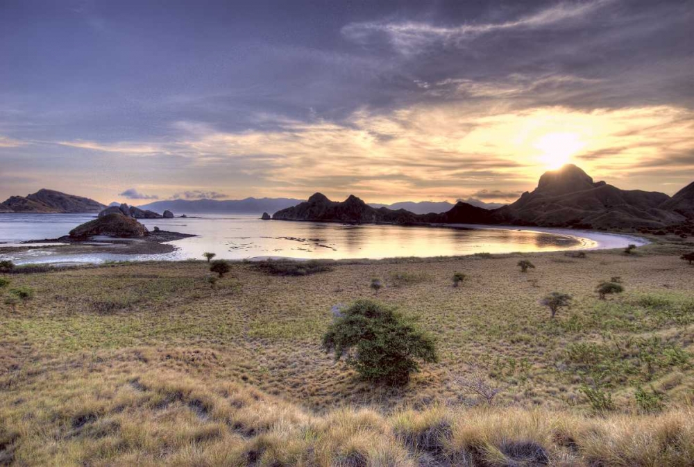 Indonesia, Komodo NP Sunset over an islands art print by Jones Shimlock for $57.95 CAD