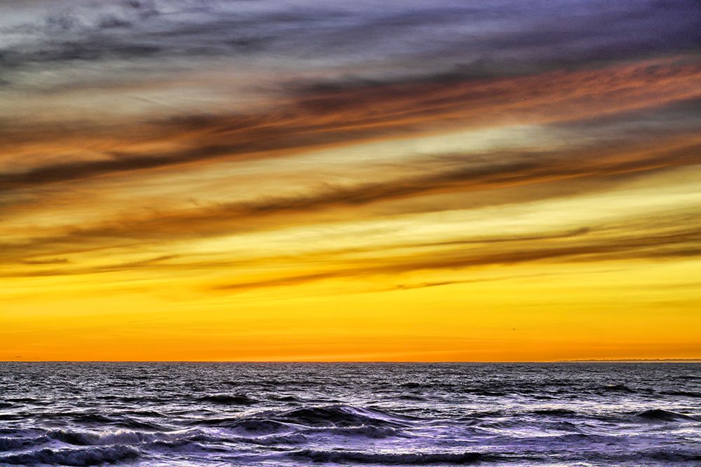 Golden light of the setting sun reflects a gold glow on the beach at Pererenan Beach-Bali art print by Greg Johnston for $57.95 CAD