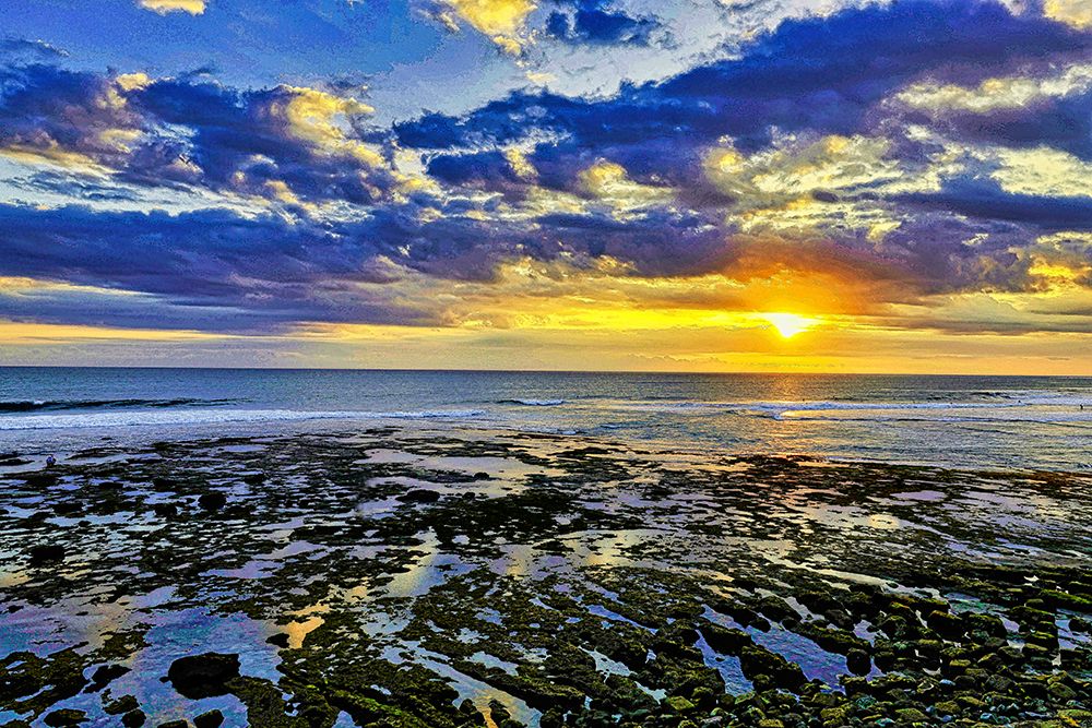 The golden setting sun reflects a gold glow on the beach at Pererenan Beach-Bali-Indonesia art print by Greg Johnston for $57.95 CAD