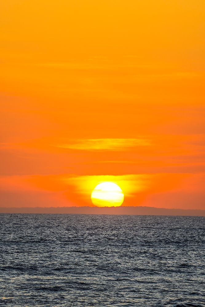 The golden setting sun reflects a gold glow on the beach at Pererenan Beach-Bali-Indonesia art print by Greg Johnston for $57.95 CAD