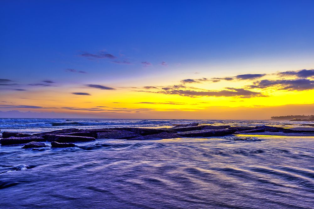 incredible colors of the sunset ritual on Pererenan Beach Bali-Indonesia art print by Greg Johnston for $57.95 CAD