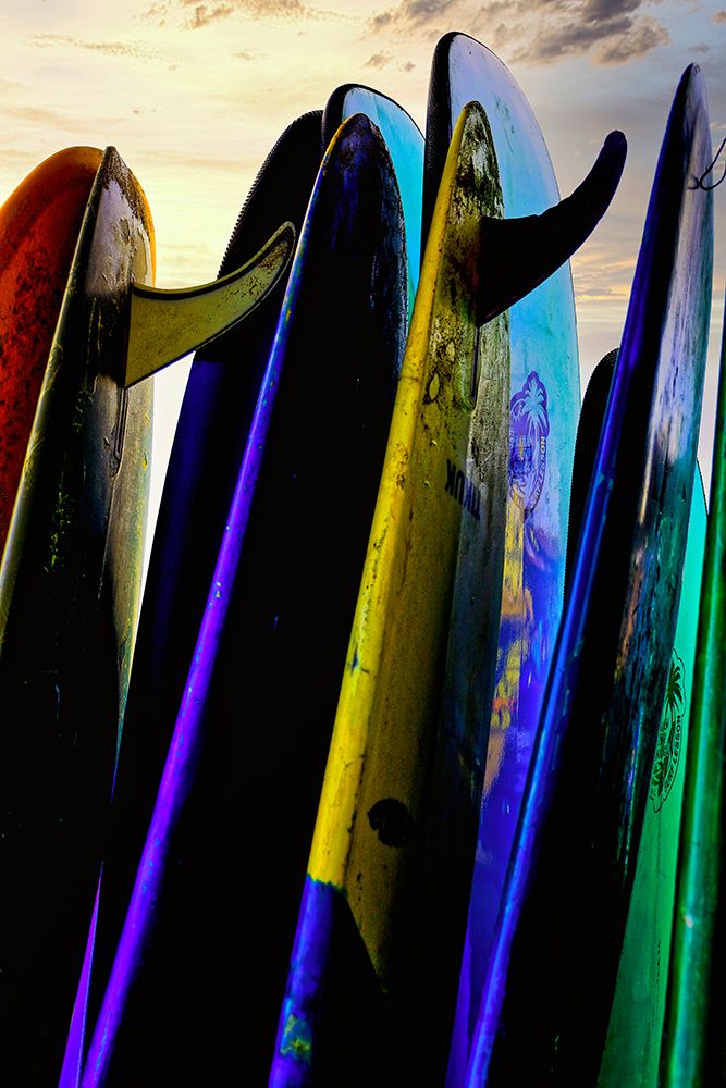 Stacked surf boards at sunset after a day of surf school in Canggu-Bali-Indonesia art print by Greg Johnston for $57.95 CAD