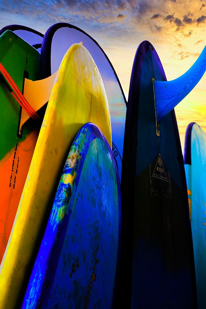 Stacked surf boards at sunset after a day of surf school in Canggu-Bali-Indonesia art print by Greg Johnston for $57.95 CAD