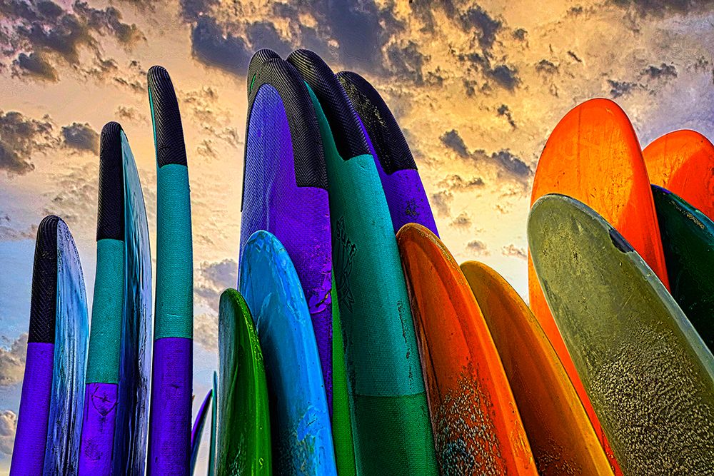 Stacked surf boards at sunset after a day of surf school in Canggu-Bali-Indonesia art print by Greg Johnston for $57.95 CAD