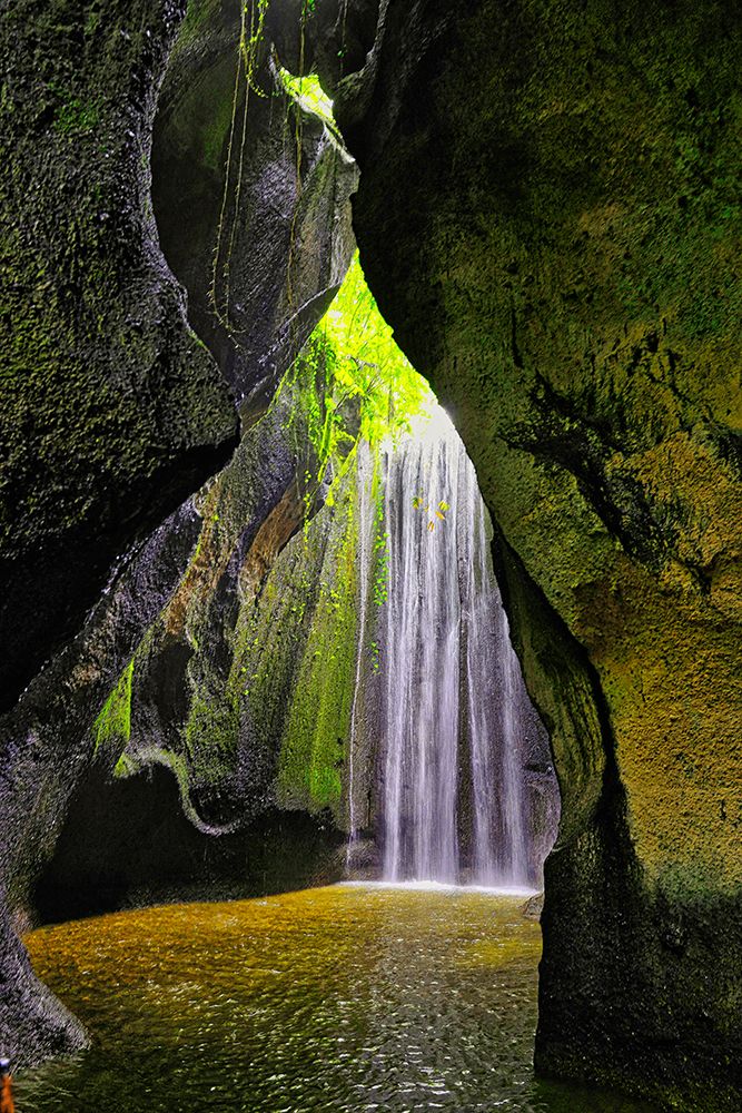 Tukad Cepung Waterfall in the central mountains of Bali-Indonesia art print by Greg Johnston for $57.95 CAD