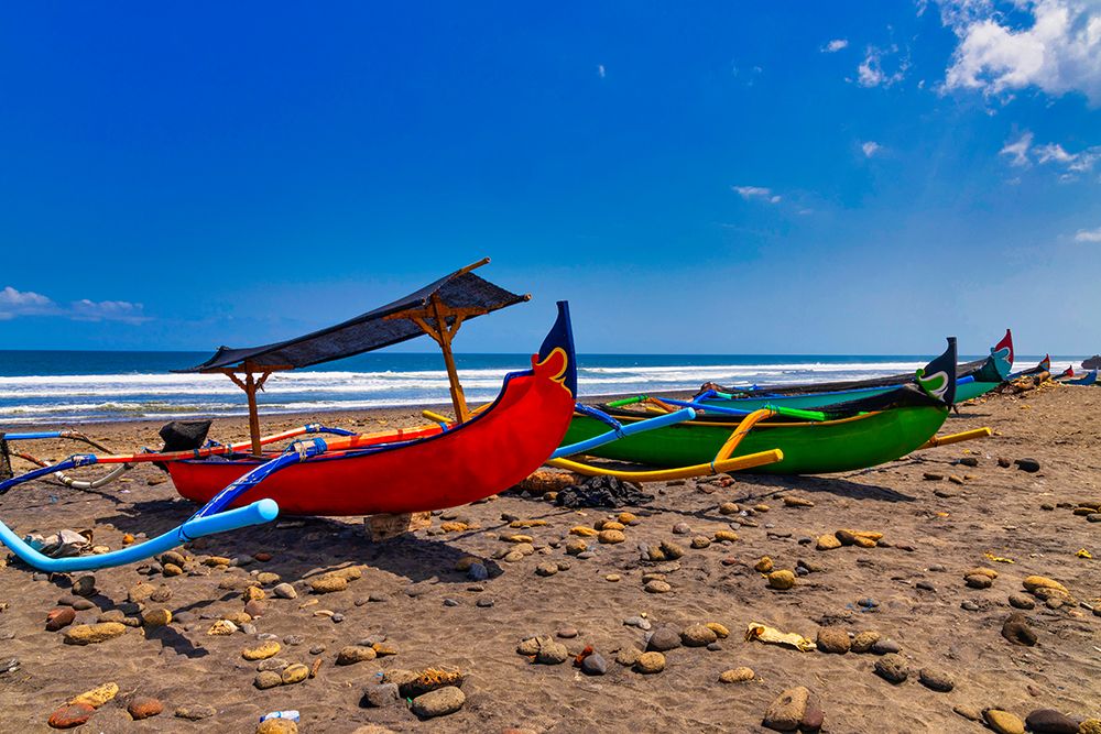 Colorful fishing boats on the beach in Yeh Gangga, Bali, Indonesia art print by Greg Johnston for $57.95 CAD