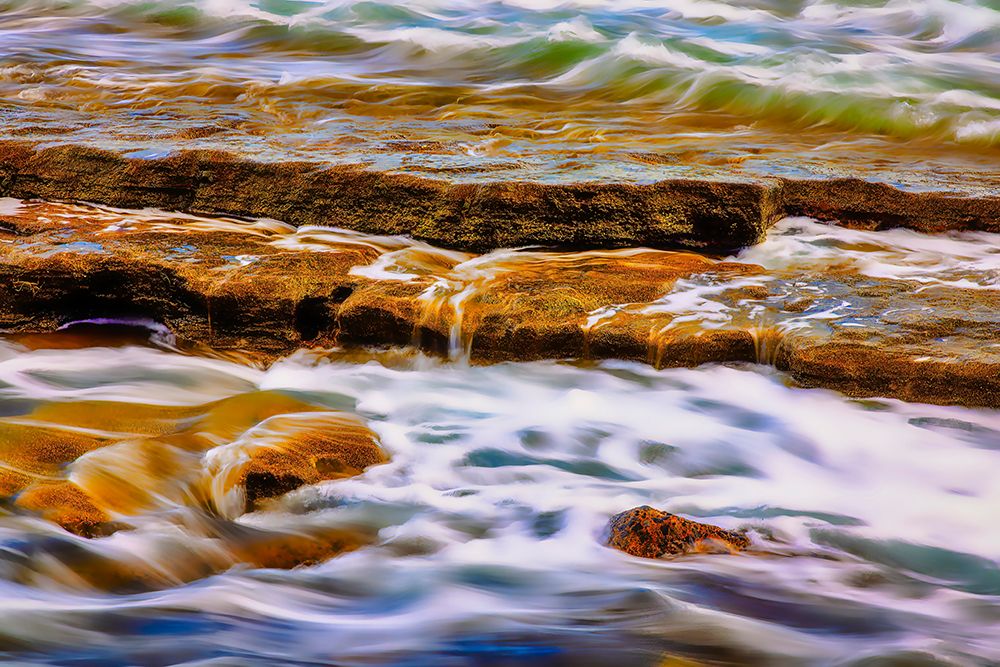 Lava beach rocks worn by centuries of sea water cover the black sand beaches of Bali art print by Greg Johnston for $57.95 CAD