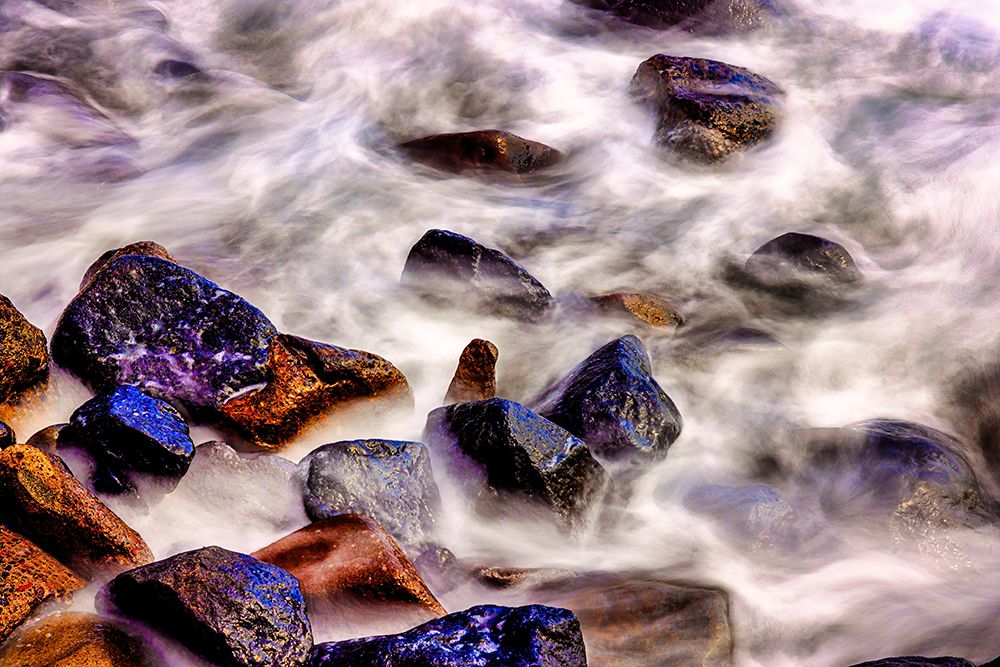 Lava beach rocks worn by centuries of sea water cover the black sand beaches of Bali art print by Greg Johnston for $57.95 CAD