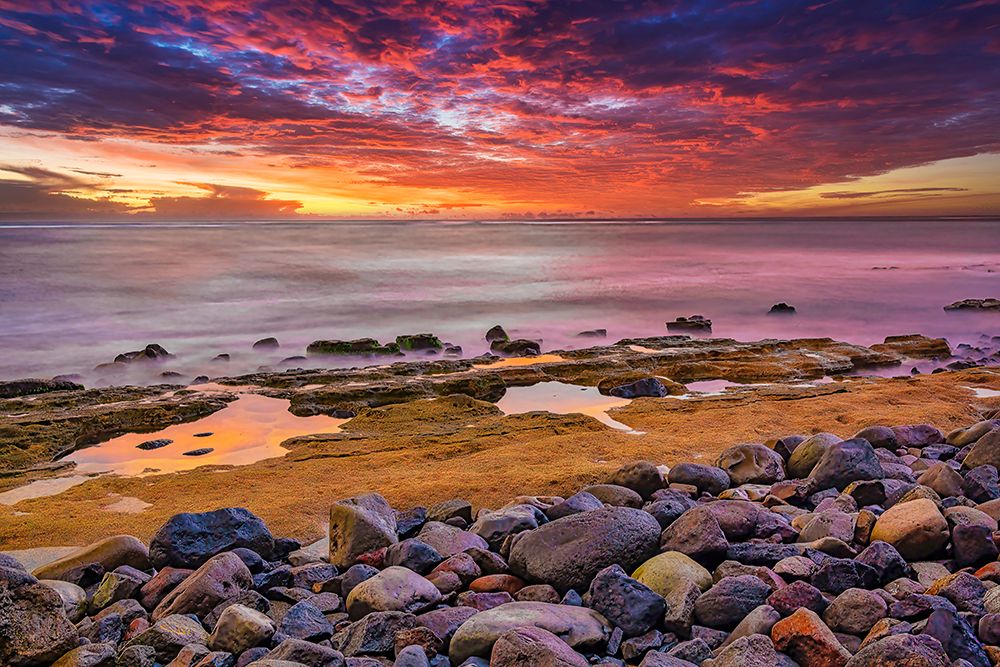 Balis sunsets are considered postcard-perfect, with their stunning colors and breathtaking scenery art print by Greg Johnston for $57.95 CAD