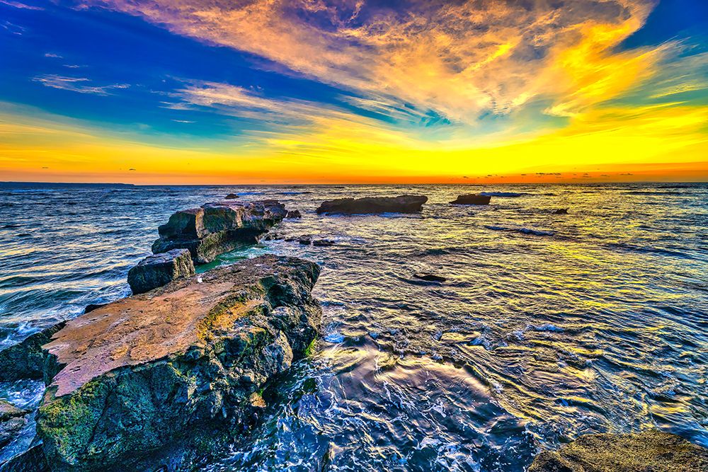 Balis sunsets are considered postcard-perfect, with their stunning colors and breathtaking scenery art print by Greg Johnston for $57.95 CAD