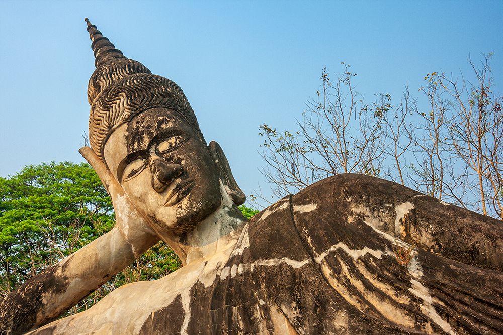 Reclining Buddha statue-Xieng Khuan-Xiengkuane-Buddha Park-Southeast Asia art print by Tom Haseltine for $57.95 CAD