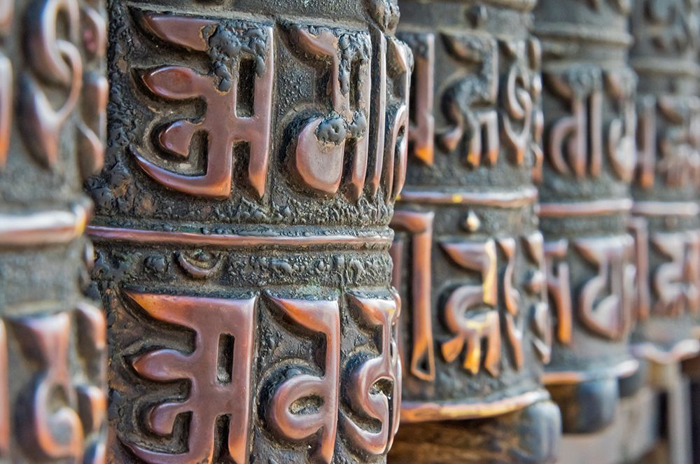 Bronze prayer wheels carved with Buddhist scripture-Swayambhunath-Kathmandu-Nepal art print by Keren Su for $57.95 CAD