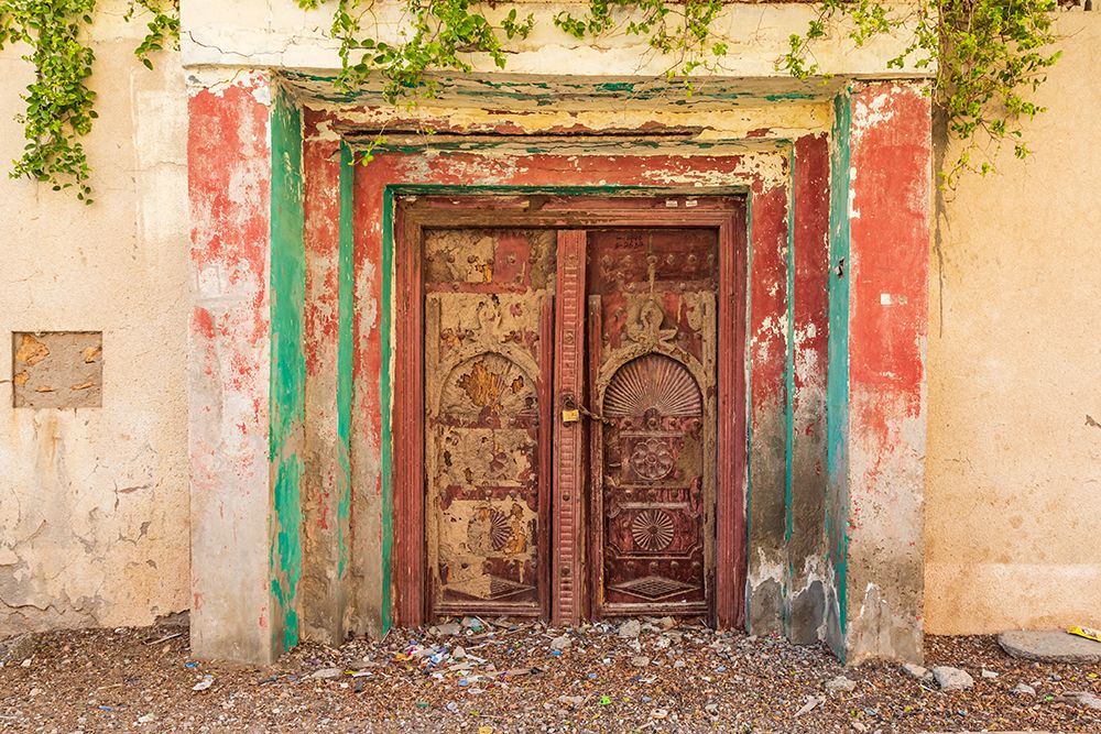 Middle East-Arabian Peninsula-Al Batinah South-Old carved wooden door on a building in Oman art print by Emily Wilson for $57.95 CAD