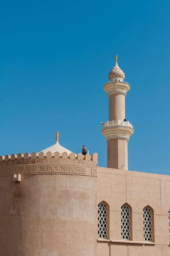 The fort of Nizwa A scenic view of the fort at Nizwa-and its minaret Nizwa-Oman art print by Sergio Pitamitz for $57.95 CAD