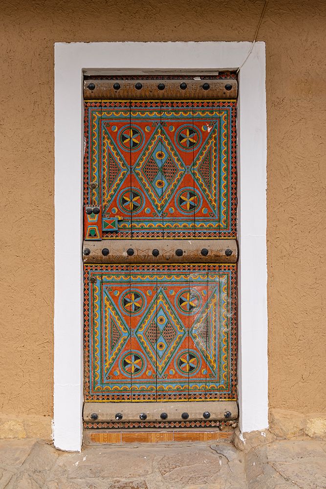 Saudi Arabia, Riyadh. Colorfully painted door in Najd Village. art print by Emily M. Wilson for $57.95 CAD