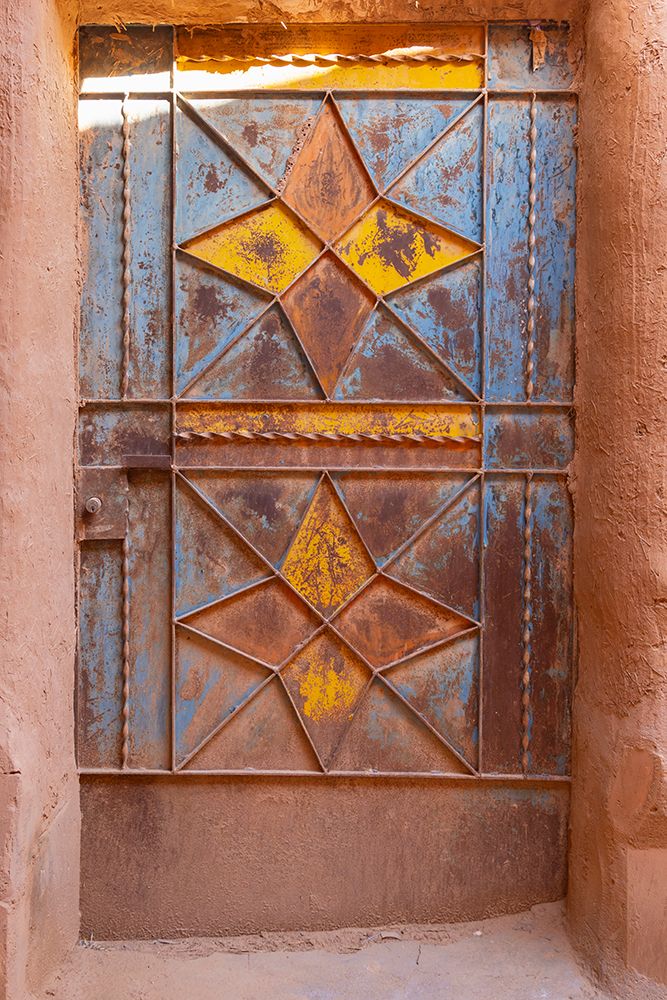 Ushaiger Heritage Village, Riyadh, Saudi Arabia. Painted metal door on an old mud brick building. art print by Emily M. Wilson for $57.95 CAD